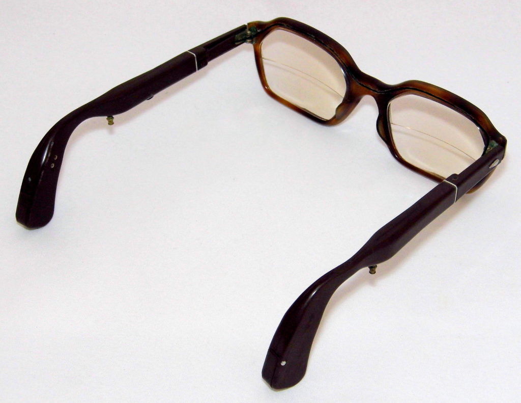 A pair of glasses with hexagon-shaped frames.